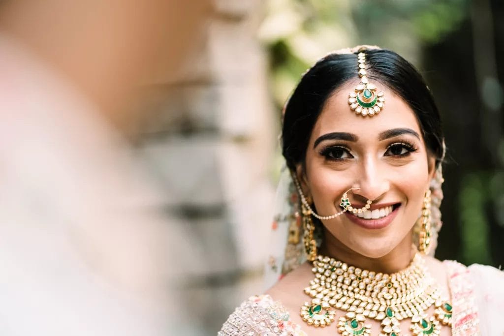 Indian bride looking into her new husbands eyes at Gaylord Palms wedding. 