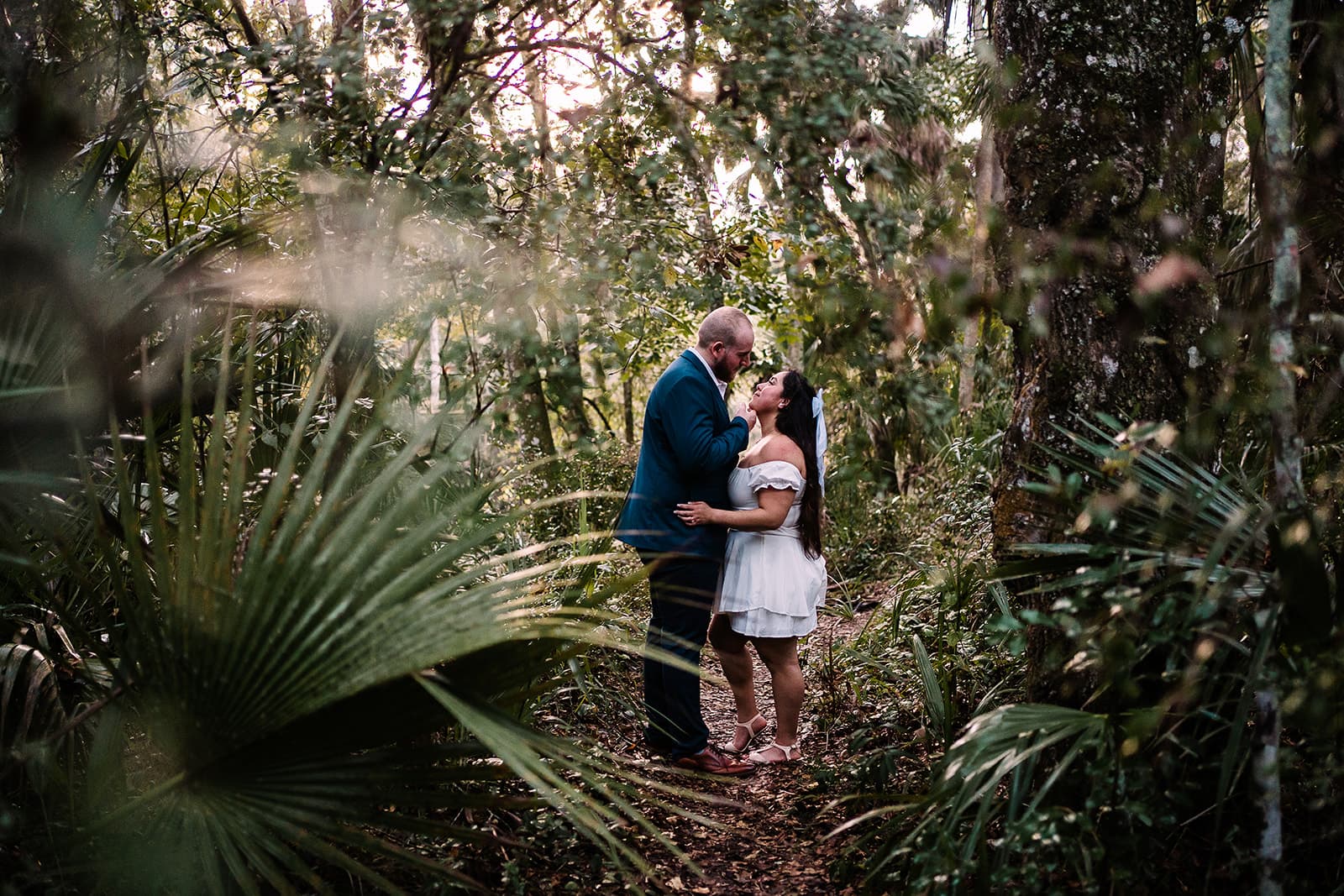 Couple looking into each others eyes at Hillsborough State Park