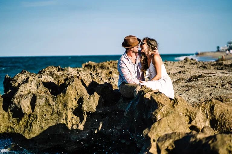 couple kissing on the beach in the bahamas