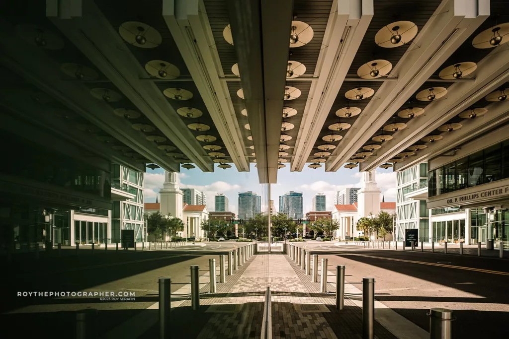 A view from the dr philips center that is mirrored on the glass wall of the building.
