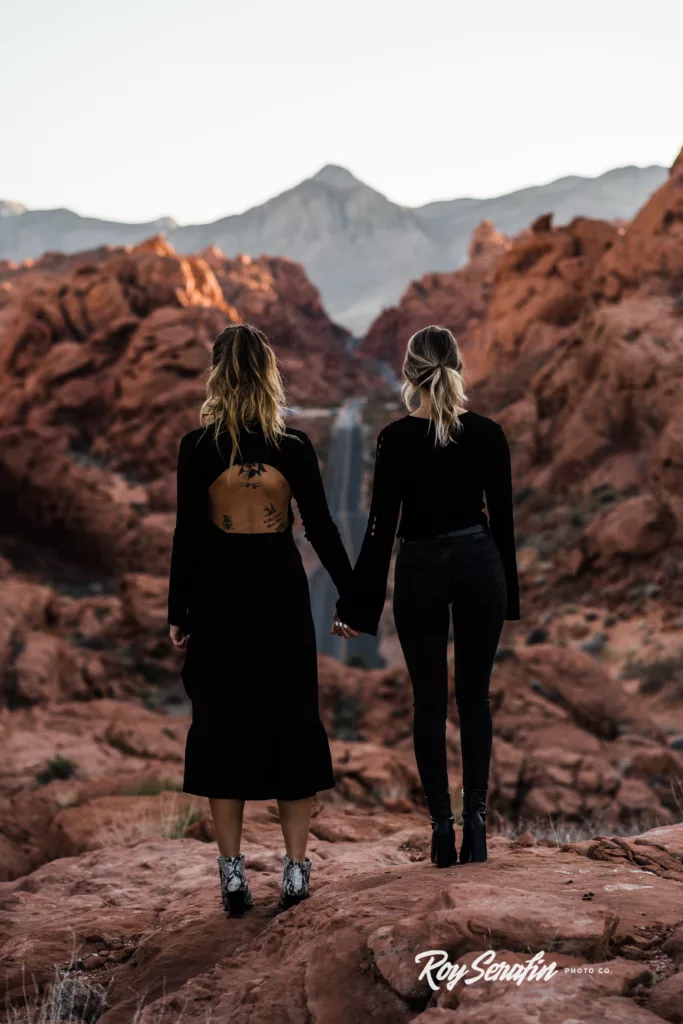 Two women looking down the Valley of Fire State Park road near Las Vegas