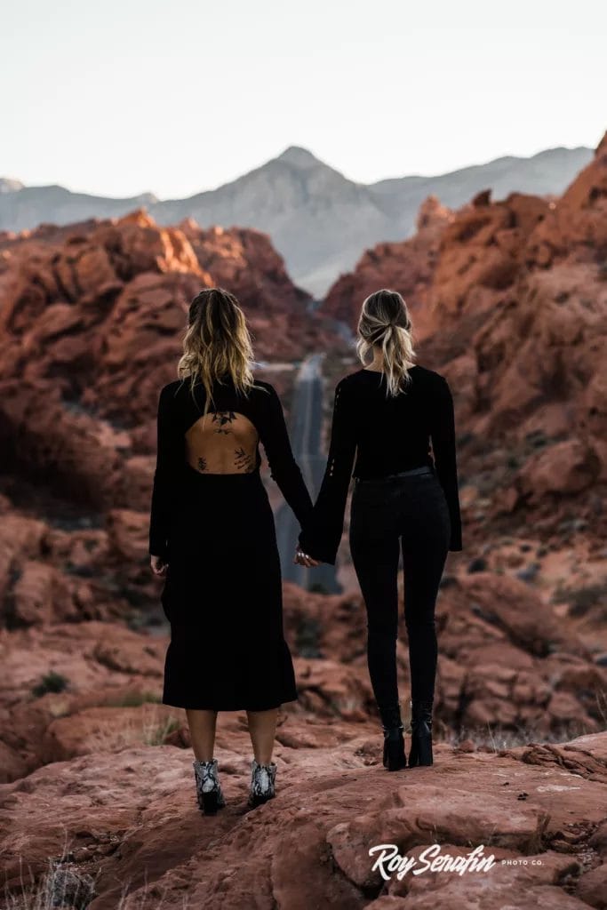 Destination Weddings in Las Vegas: The Ultimate Guide 8 Two women looking down the Valley of Fire State Park road near Las Vegas