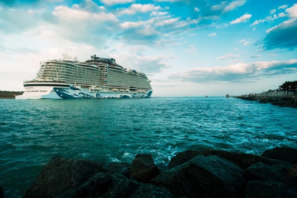 A royal caribbean cruise ship at sunset heading to belize. 