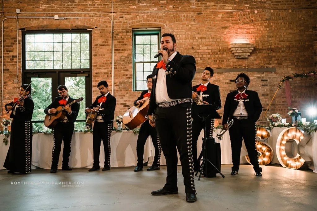 A mariachi band at a mexican wedding.