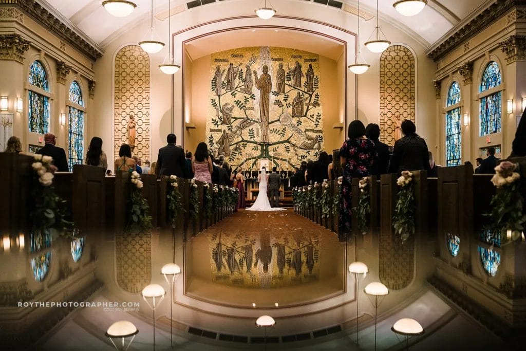 A ceremony ina catholic church during a mexican wedding.