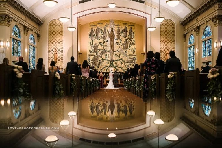 A ceremony ina catholic church during a mexican wedding.