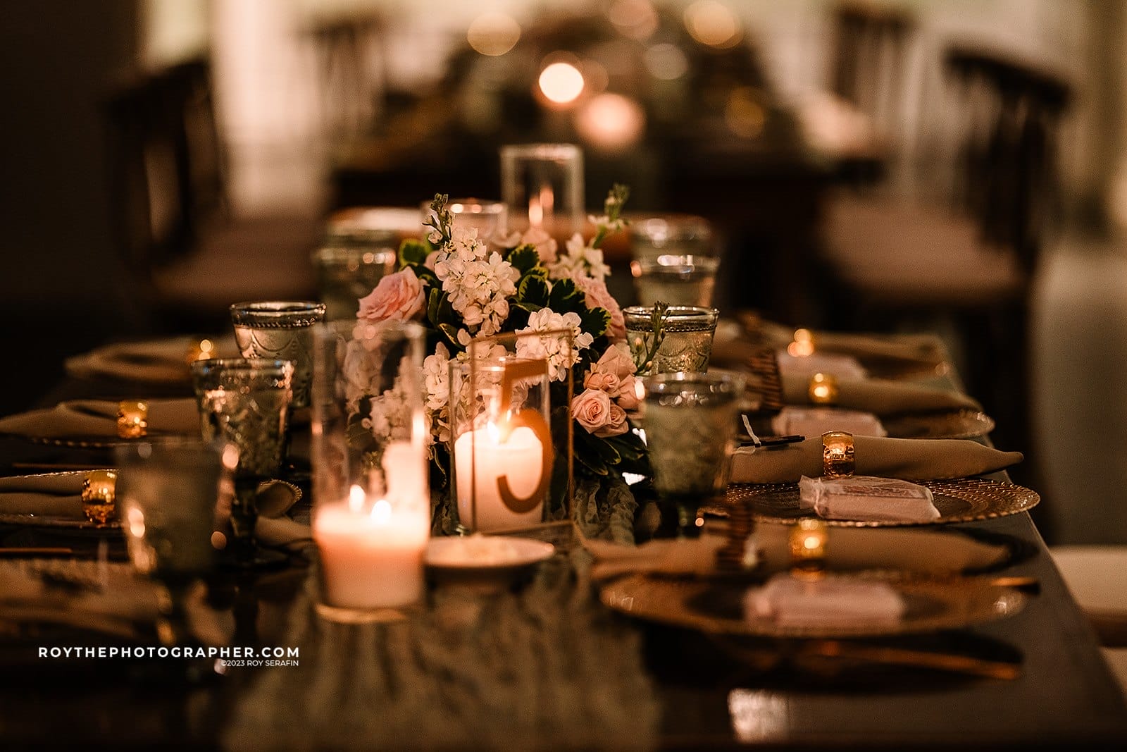 Wedding Flower Shops in St. Augustine, Florida 3 A st augustine floral arrangement on a reception table lit by candles in the lightner museum.