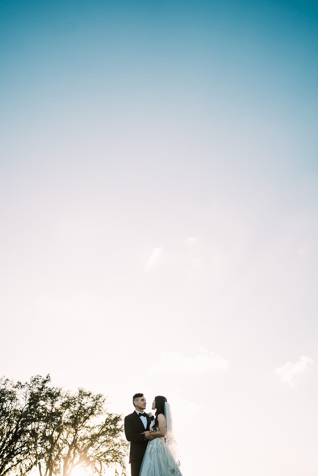 Orlando Wedding Photographer 12 Bride and groom under clear sky